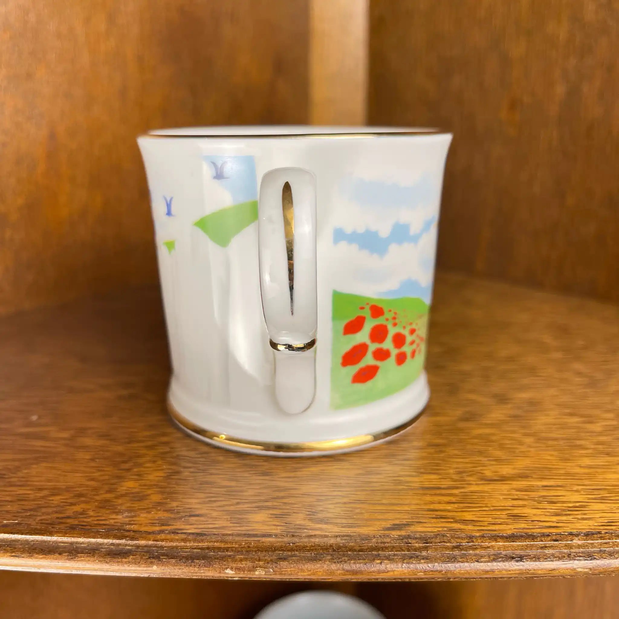 【リユース】磁器製コップ 虹柄