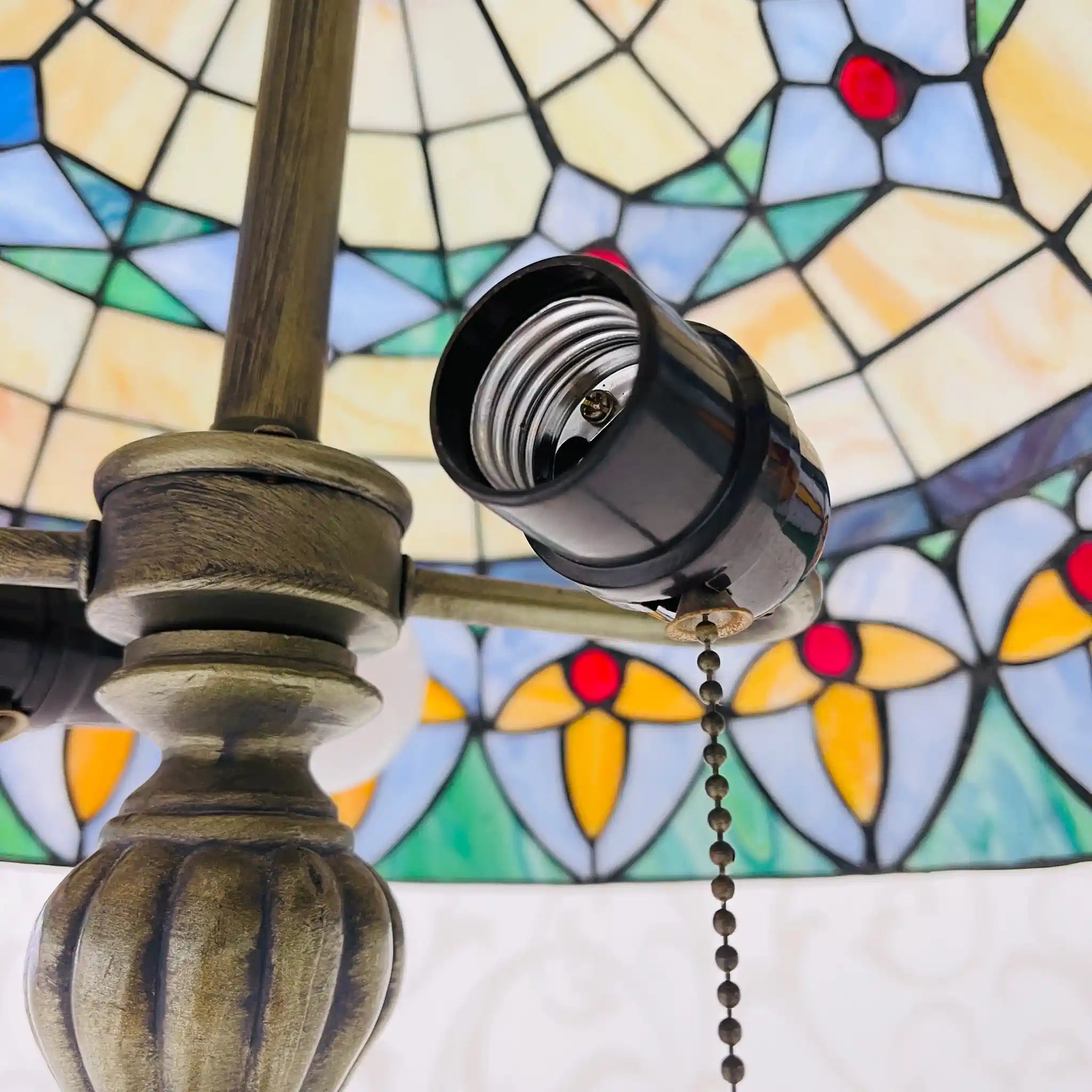 Vintage lamp with stained glass shade, likely from the late 20th century, made in England.