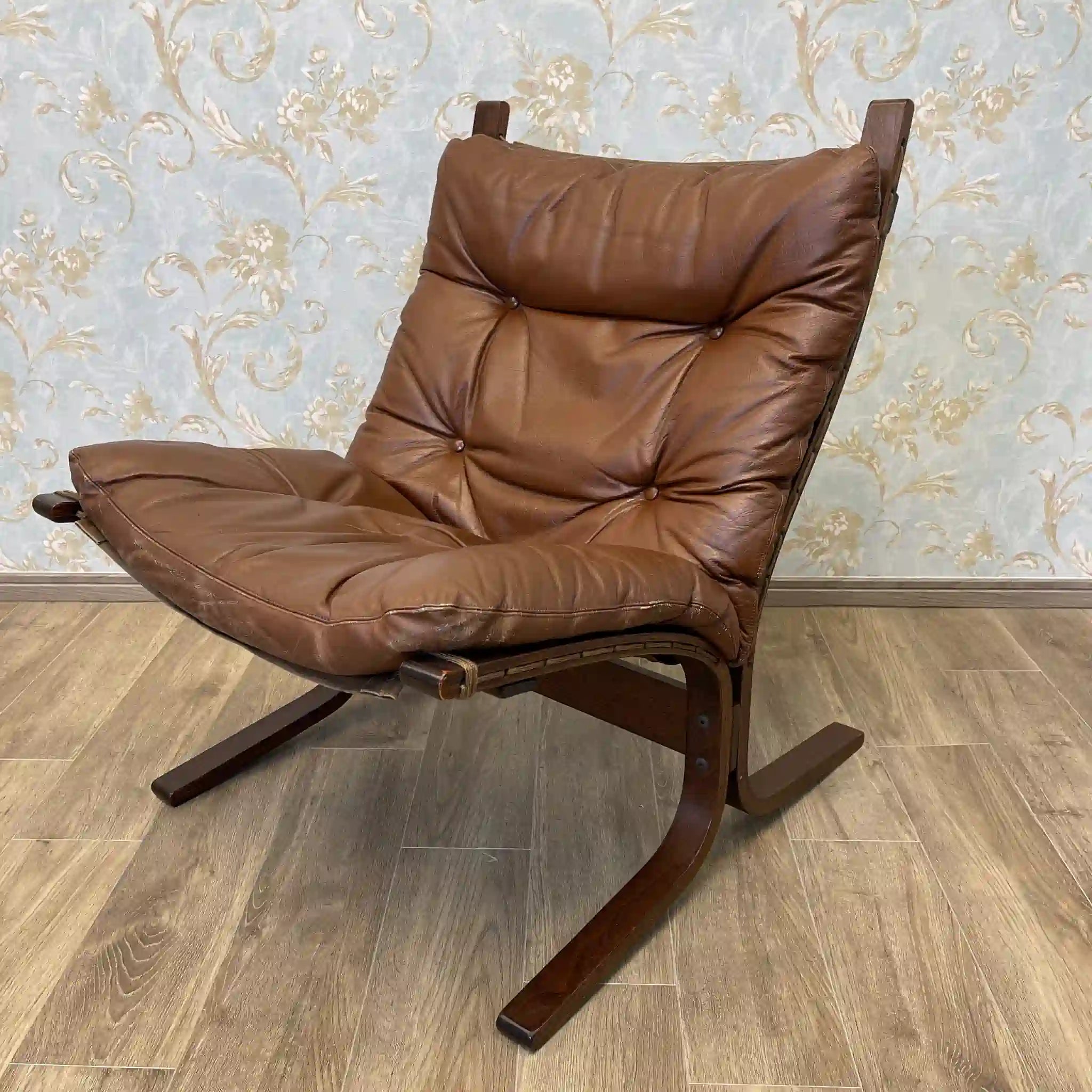 Vintage lounge chair by westnofa furniture, Norway, with canvas suspension and button-tufted leather.