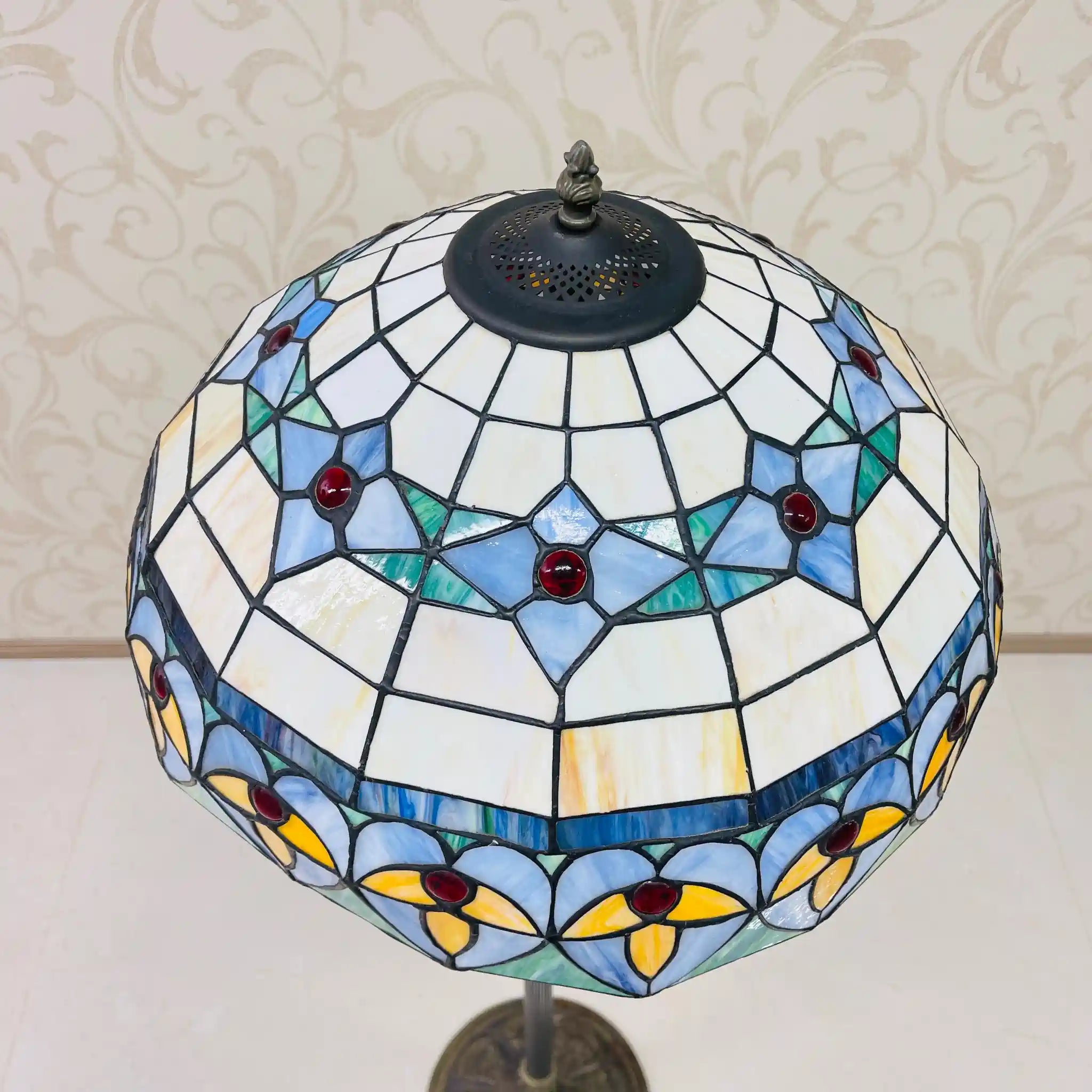 Vintage lamp with stained glass shade, likely from the late 20th century, made in England.