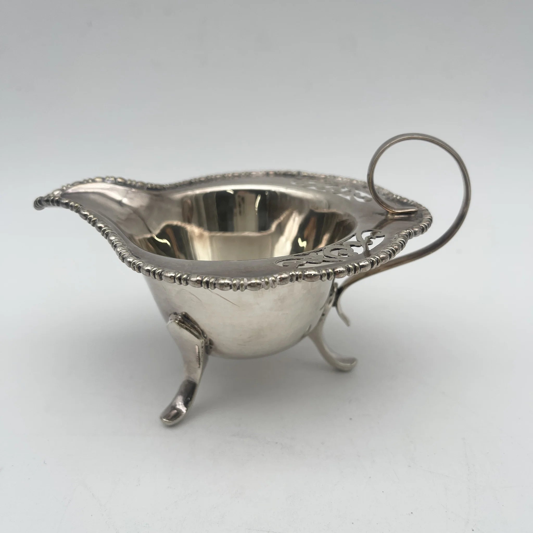 [Antique] Creamer (milk pitcher) / Estimated early 20C / Silver plate / England / EPNS, with legs, openwork carving