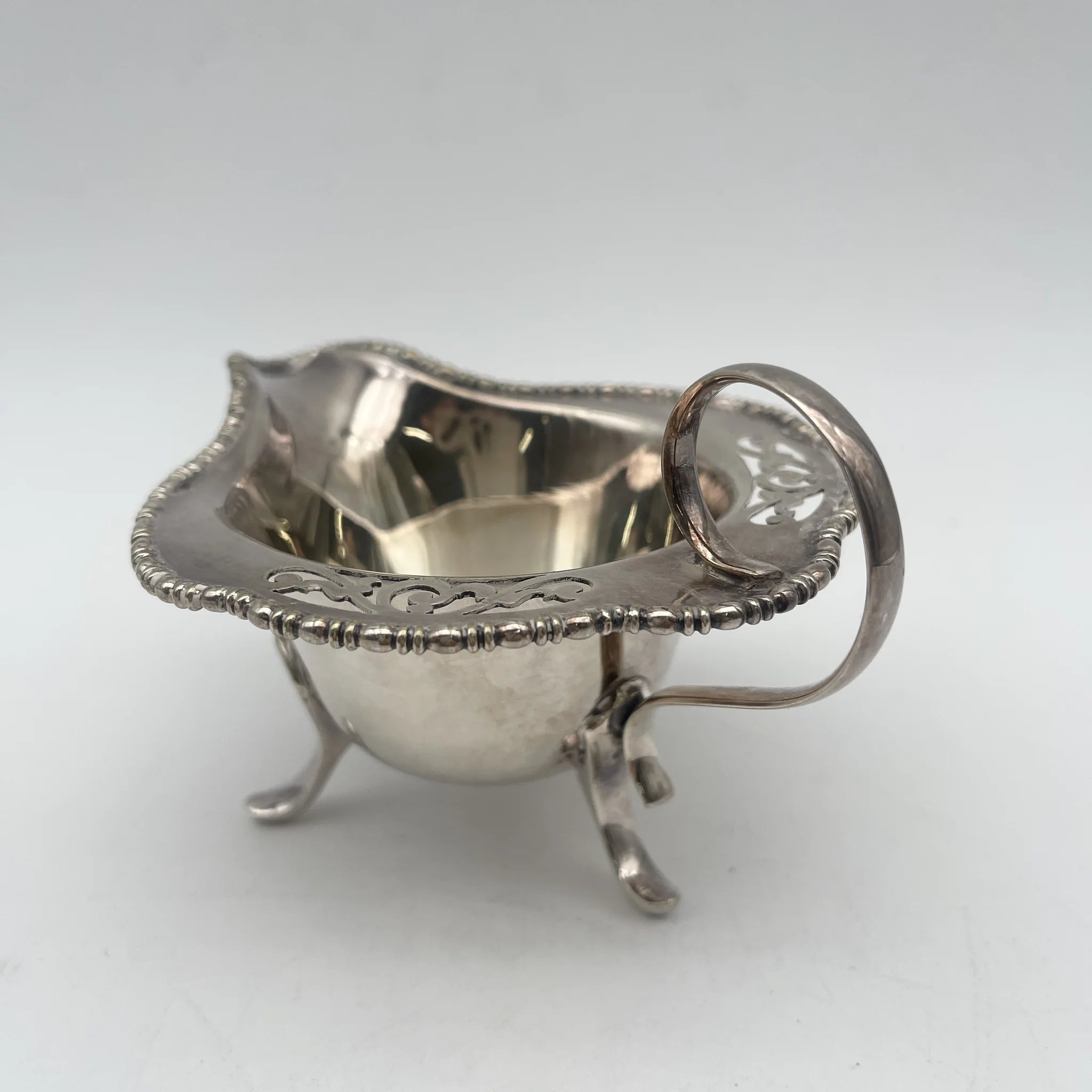 [Antique] Creamer (milk pitcher) / Estimated early 20C / Silver plate / England / EPNS, with legs, openwork carving