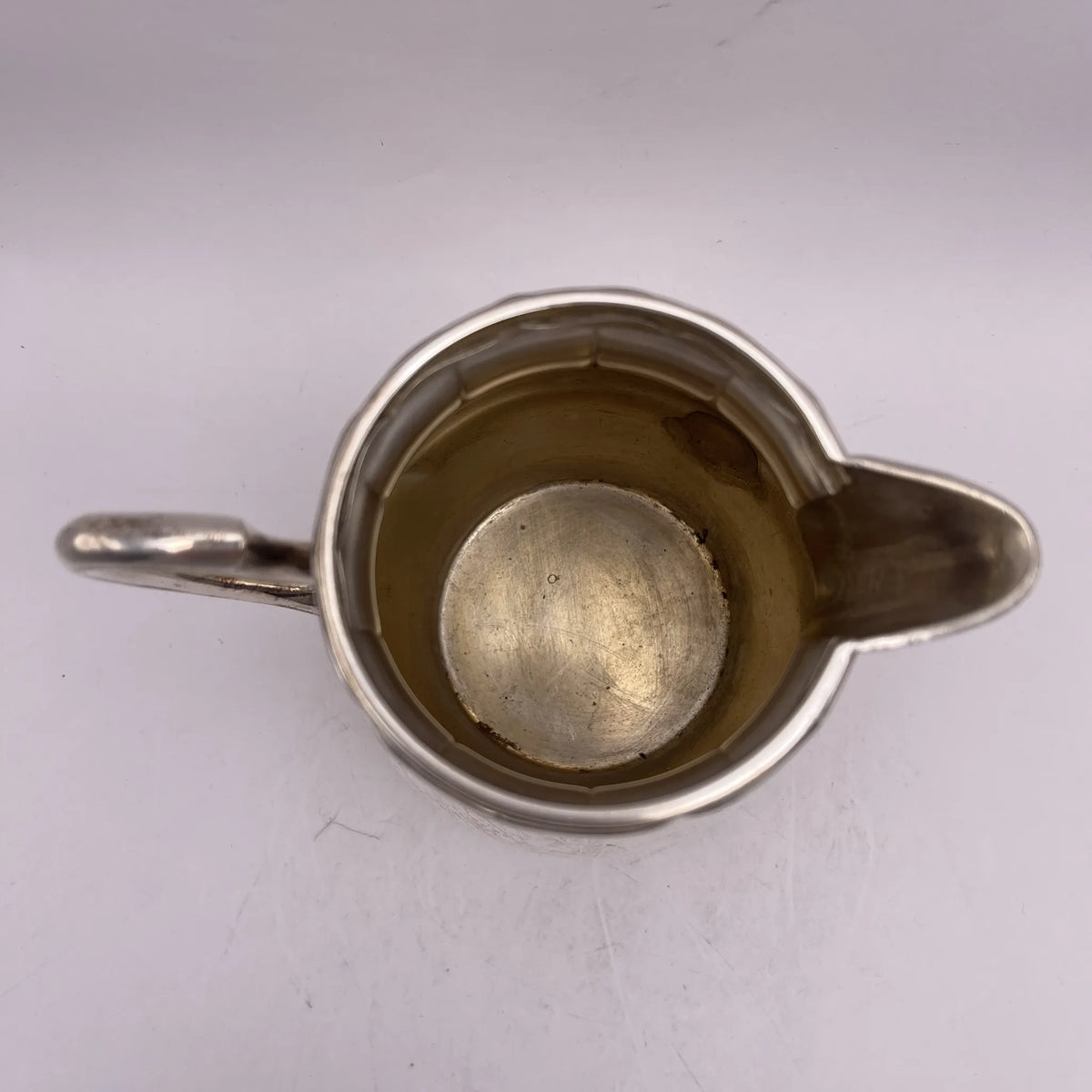 Henry Stratford Ltd / Milk pitcher / 1900-early 1920s / Silver plated / England / Britannia metal, scalloped rim / [Vintage]