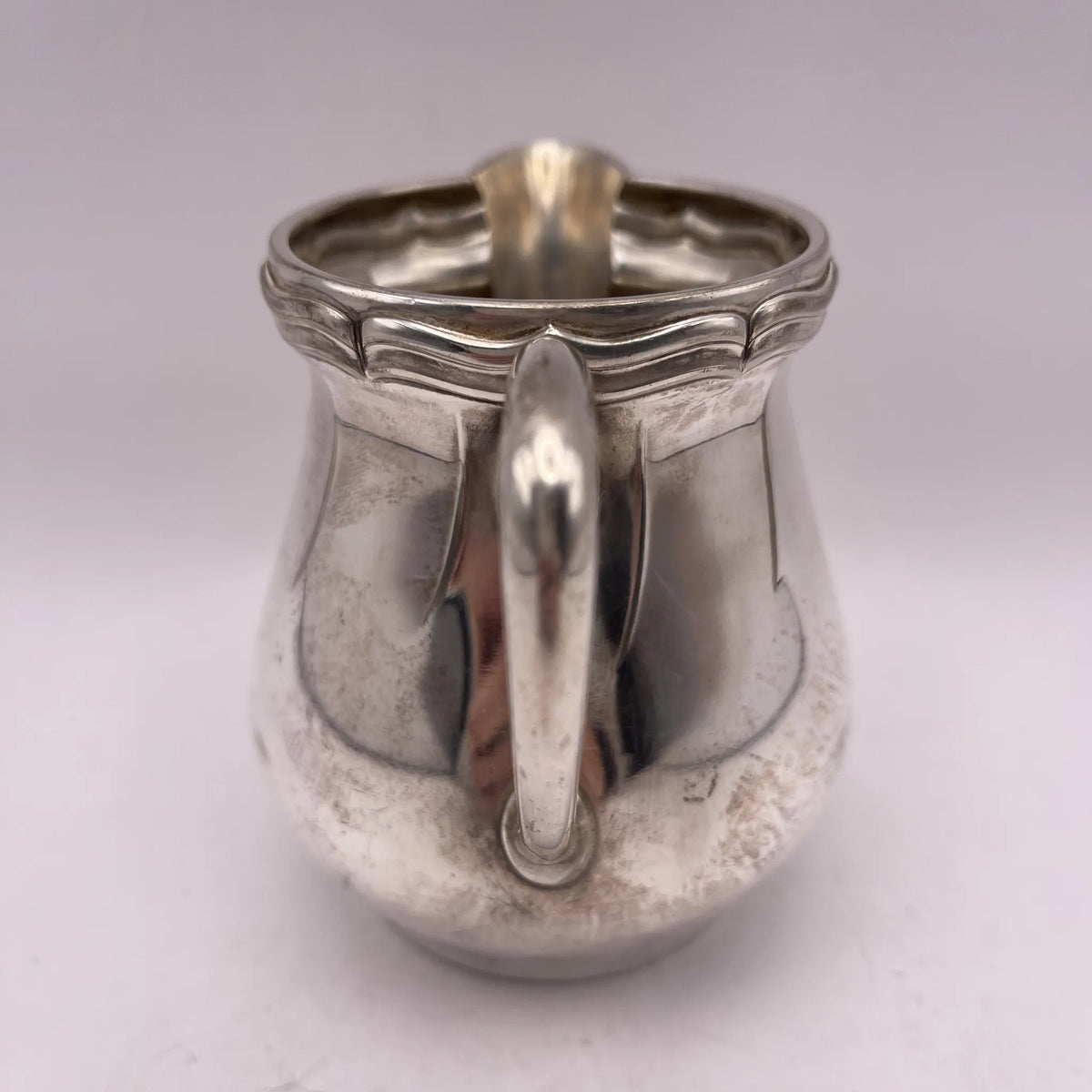 Henry Stratford Ltd / Milk pitcher / 1900-early 1920s / Silver plated / England / Britannia metal, scalloped rim / [Vintage]