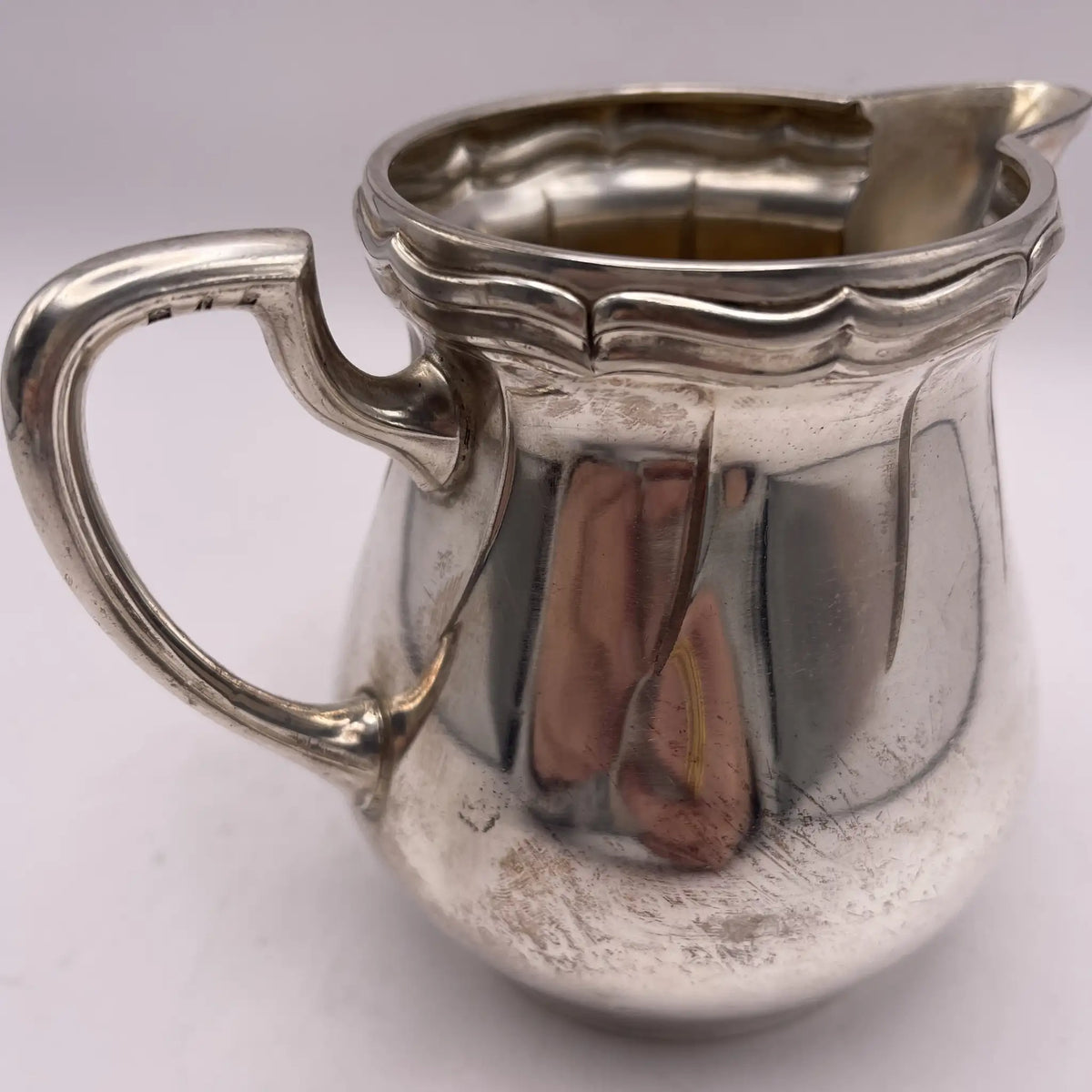 Henry Stratford Ltd / Milk pitcher / 1900-early 1920s / Silver plated / England / Britannia metal, scalloped rim / [Vintage]